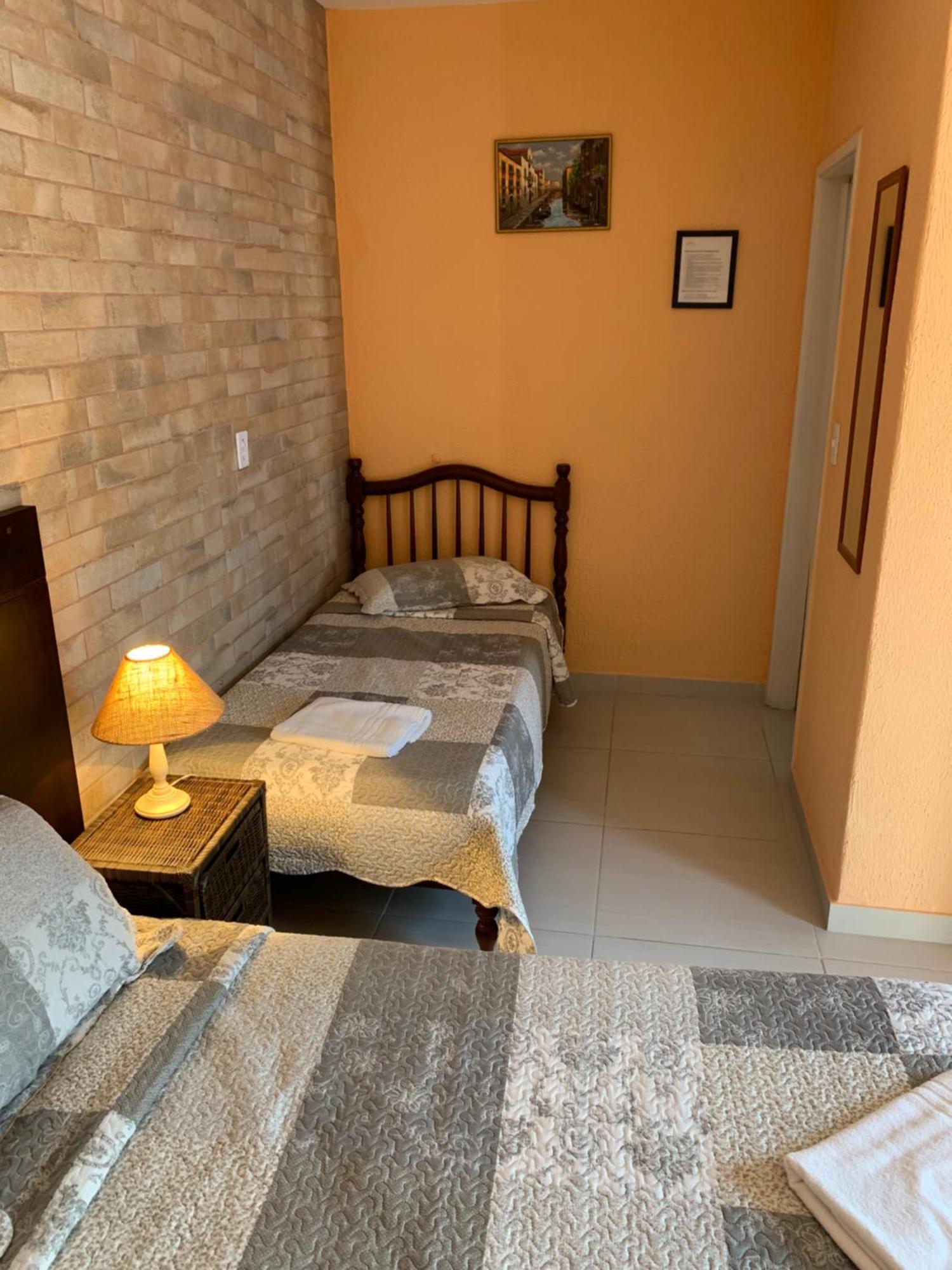 Villa Di Verona Charm Hotel Guarujá Quarto foto